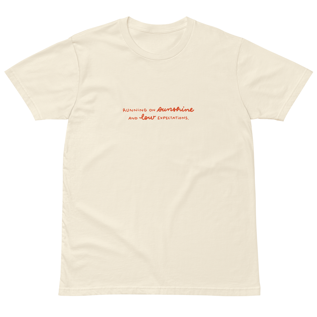 Running on sunshine premium t-shirt in Ivory.